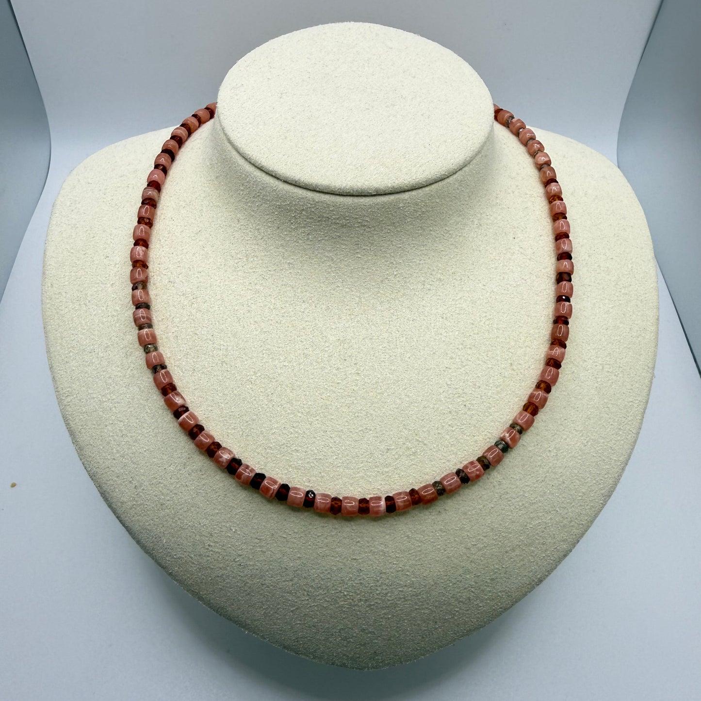 Rosey beaded necklace on a white display bust