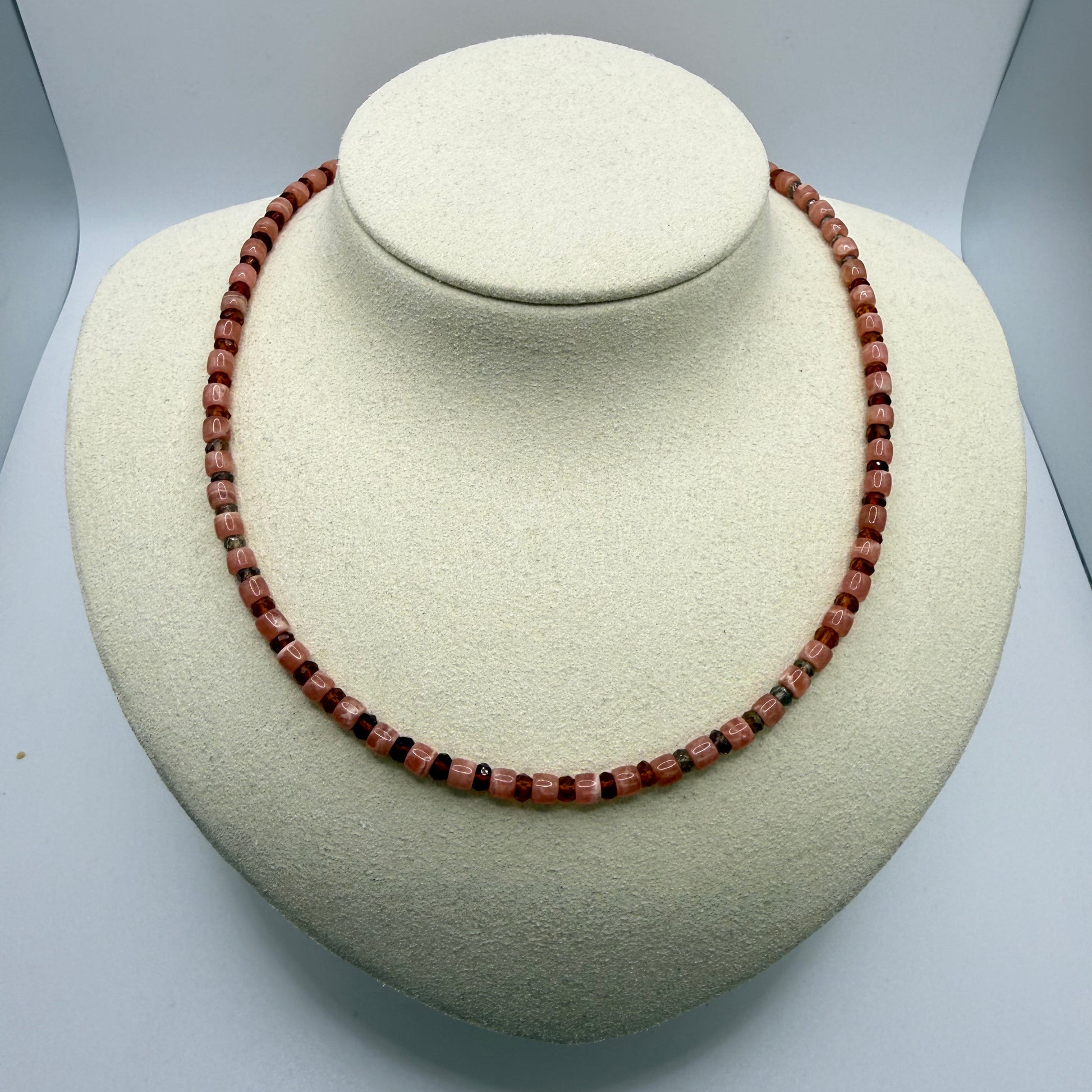 Rosey beaded necklace on a white display bust